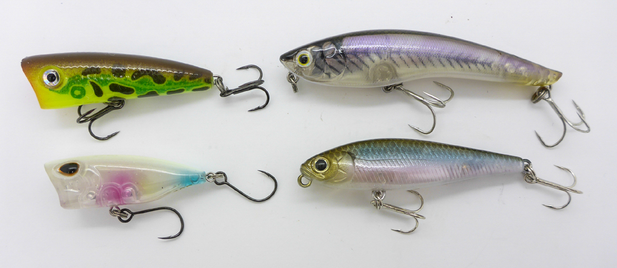 Obere Reihe: Rapala UL Pop, Nories ZagStick Pencil Untere Reihe: Gomoku Popper, Bevy Pencil 